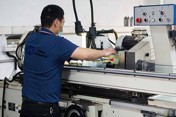 CNC engineer operating a machining centre